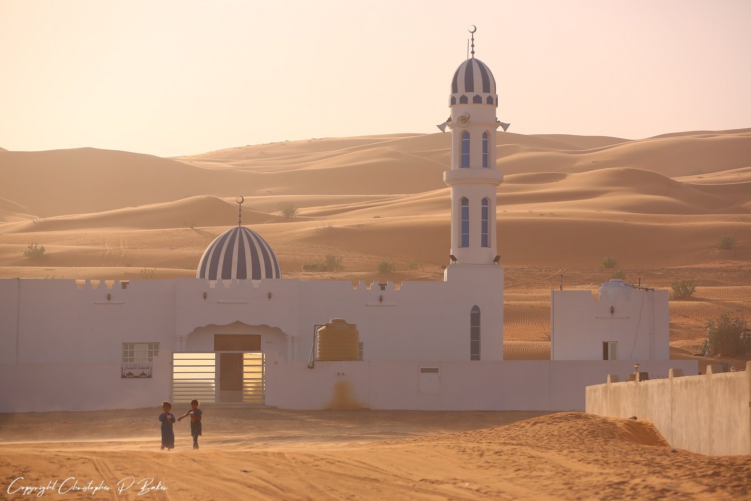 Children at mosque Sharqiya Sands Oman copyright Christopher P Baker